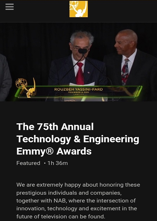 “Rouzbeh Yassini speaking on stage with his name and LANcity CEO title displayed”