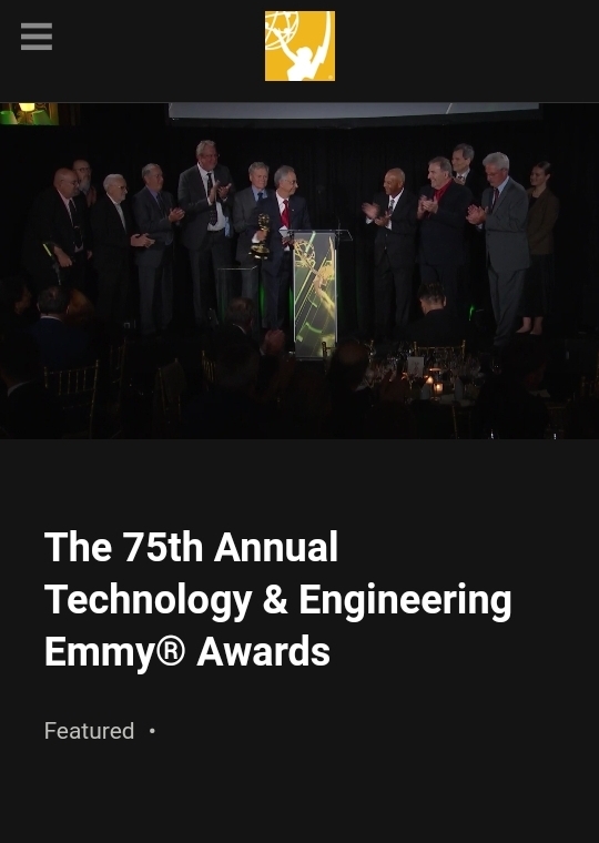 “Rouzbeh Yassini concluding Emmy speech with Emmy award in hand and applause”